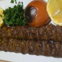 Beef Kebab Plate · Skewer of grilled beef. Basmati rice topped with saffron. Sided with grilled tomatoes and ve...