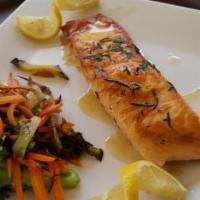 Grilled Salmon Fillet · Grilled salmon with garlic lemon reduction sauce served with vegetables.`