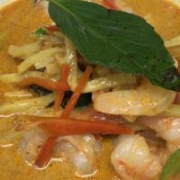 Yellow Curry · Spicy. Traditional-style yellow curry sauce with bamboo shoots and basil.