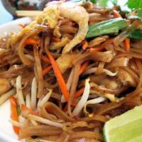 Pad Thai · Soft thin rice noodles sautéed with eggs, green onions, bean sprouts, fresh lime wedges, car...