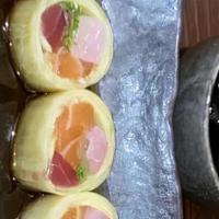 Naruto Roll · Salmon, tuna, yellowtail, kaiware, and cucumber sheet.