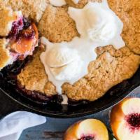 Peach Blackberry Cobbler Slice · Sweet peaches and tangy blackberries baked with fluffy shortcake topping crusted with sugar....
