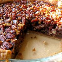 Maple Bourbon Pecan Pie Slice · All our pecan pies are made in-house with the finest ingredients.  This wonderful pie is mad...