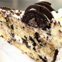Oreo Cake Slice · This cake is a combination of vanilla and Oreo cookies: vanilla cake layerd with a vanilla i...