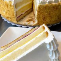 Lemon Raspberry Cake Slice · A simple white cake with light layers of frosting and one layer each of raspberry jelly  and...
