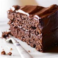 Chocolate Ganache Cake Slice · This rich, silky, moist, dense chocolate ganache cake is the essence of chocolaty love.