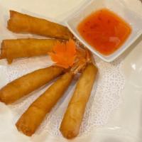 Shrimp Rolls · (5) Marinated shrimp wrapped in crispy rice paper. Served with sweet chili sauce.
