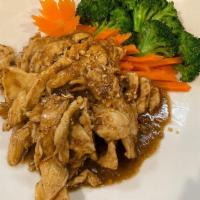 Garlic Delight · Sautéed meat with fresh garlic in oyster sauce on a bed of broccoli and carrots, sprinkled w...