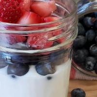 Fruit & Yogurt Parfait · Plain Greek & Vanilla Yogurt blend, Blueberries, Craisins, & Granola