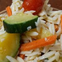 Orzo Veggie Pasta · Orzo Pasta with an olive oil lemon sauce, mixed with fresh carrots, zucchini, yellow squash,...