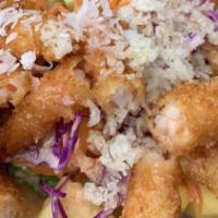 Coconut Shrimp Classic · Tempura shrimp,classic sauce( sweet and sour) cucumber , avocado, mango, carrots, purple cab...