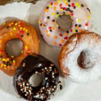 Donuts · Glazed, sugar and  choco covered donuts.
Box of 6 units