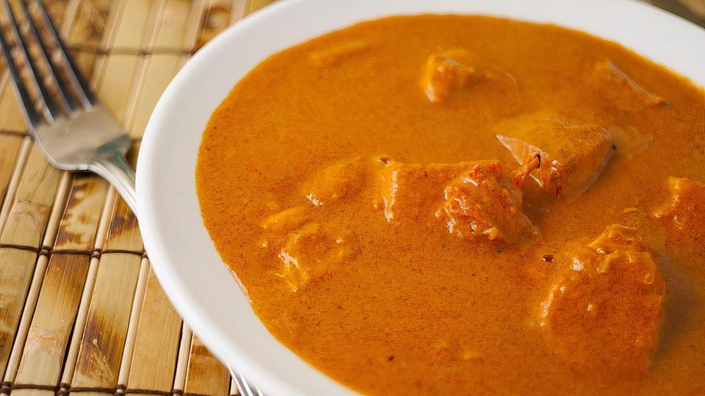 Chicken Curry · Cubes of tender chicken cooked in traditional curry sauce.