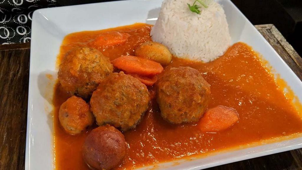 Albondigas En Chipotle · Spicy. Flavorful Mexican meatballs in a chipotle tomato sauce with potatoes and carrots and white rice.