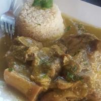 Chamorro En Salsa Verde · Pork shank smothered in our signature tomatillo sauce and white rice.
