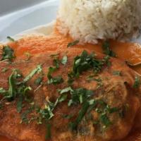 Chile Relleno De Queso · Vegetarian. Battered roasted poblano pepper, stuffed with queso fresco, topped with tomato s...