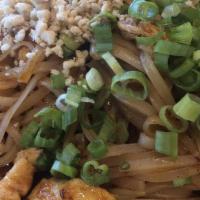Pad Thai · Stir fried wide rice noodle, egg, bean sprouts, scallions and sweet and sour sauce, topped w...