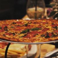 Margherita  · Mozzarella, burrata, tomato sauce, basil pesto