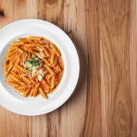 Penne Alla Vodka · Penne tossed in a creamy pink tomato vodka sauce. Add chicken and shrimp for an additional c...