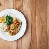 Baked Haddock · White wine butter sauce, toasted crumbs, jasmine rice and saute spinach.