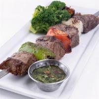 Rib Eye Skewer · Two sides of your choice.