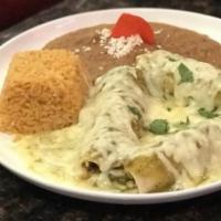 Enchiladas · Choice of shredded chicken, ground beef, or Monterey Jack cheese with choice of green, suiza...