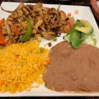 Fajita Plate · Your choice of grilled beef or chicken seasoned fajita with bell peppers and onions. Served ...