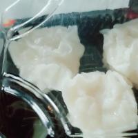 Shumai · Six steamed shrimp dumplings.