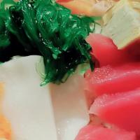 Chirashi · An assortment of freshly sliced raw fish saved over seasoned sushi rice.