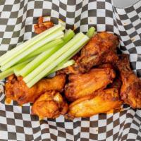 Smoked Chicken Wings · Gluten friendly. Buffalo, chipotle BBQ, or jalapeño whiskey glaze, celery, blue cheese dress...