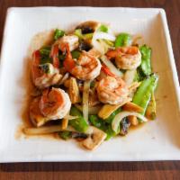 Snow Peas · Sautéed snow peas, onions, mushrooms, baby corn, and scallions in brown sauce. Served with j...