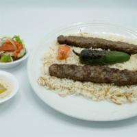 Kufta Kabob · Minced beef with parsley, onion and spices, served with yogurt sauce.
