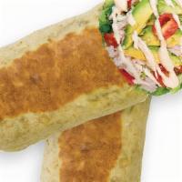 Avocado Turkey · Turkey wrap with sliced tomatoes, romaine, muenster cheese, avocado and hummus. Your choice ...