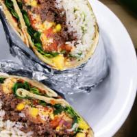 Burrito · 14 inch ﬂour tortilla stuﬀed with all your favorites and rolled to perfection.