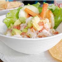 Shrimp Ceviche · Small pieces of fresh shrimp cooked in lime juice with diced tomato, onions, and cilantro to...