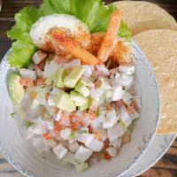 Fish Ceviche · Small pieces of fresh fish filet cooked in lime juice with diced tomato, onions, and cilantr...