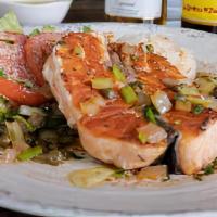 Grilled Caper Salmon · Grilled, served with homemade rice and fresh green salad.