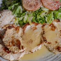 Grilled Chicken Al Patron · Juicy grilled chicken breast marinated and topped with our special lime dressing, served wit...