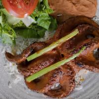 Zarandeado Octopus · Whole octopus zarandeado marinated with soy sauce, garlic, mustard, and chipotle, served wit...