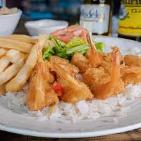 Breaded Shrimp · Breaded and deep fried to perfection, served with rice and French fries.