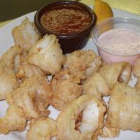 Calamari · Lightly Battered calamari served with marinara & aioli sauce
