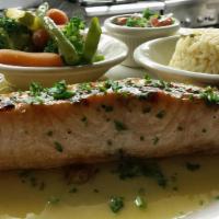 Grilled Salmon · Topped with olive oil, lemon, butter wine sauce, served with vegetables, rice and salsa fresca
