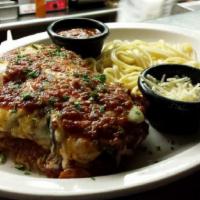 Chicken Eggplant Parmesan · Two tender chicken breast topped with eggplant, tomato sauce, mozzarella and parmesan cheese...