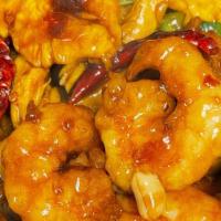 Kung Pao Delight · Hot and spicy. Marinated shrimp, chicken and beef sautéed with dry hot pepper, bell pepper, ...