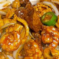Black Pepper Beef, Chicken & Shrimp · Hot and spicy. Beef, chicken and shrimp, mushroom, yellow onion and jalapeño in black pepper...