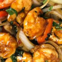 Basil Shrimp · Hot and spicy. Shrimp sautéed with red and green bell pepper, onion, snow peas, jalapeño and...