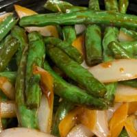 Spicy Green Bean · Hot and spicy. Green bean, yellow onion, jalapeño in spicy brown sauce.