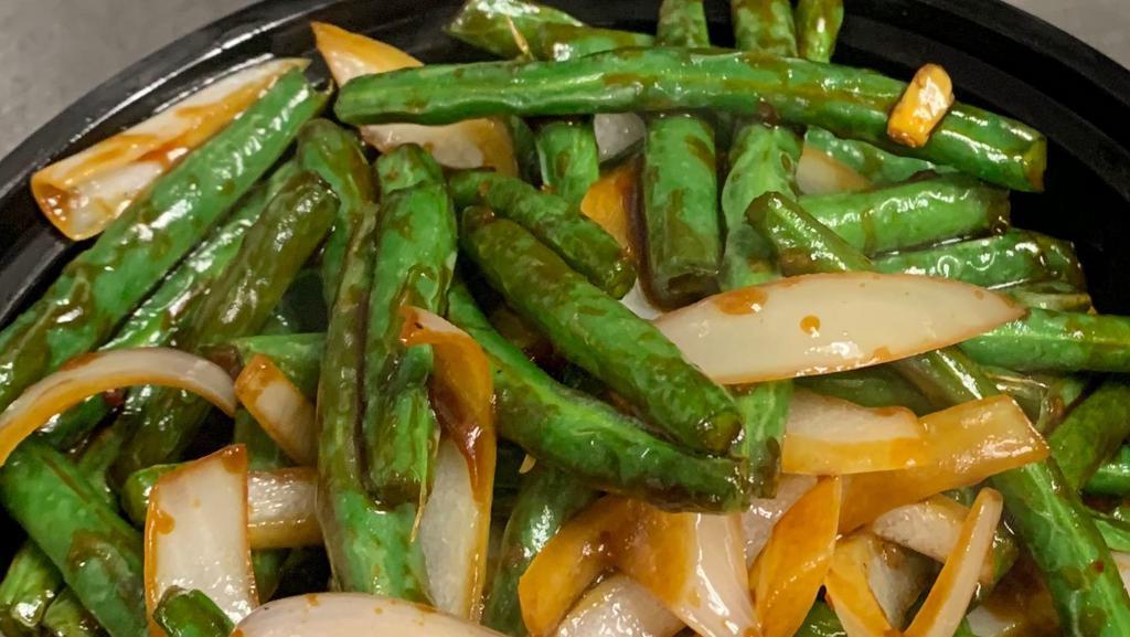 Spicy Green Bean · Hot and spicy. Green bean, yellow onion, jalapeño in spicy brown sauce.