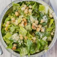 Caesar · Crisp romaine, shaved parmigiana, romano and croutons. Add chicken for an additional charge.