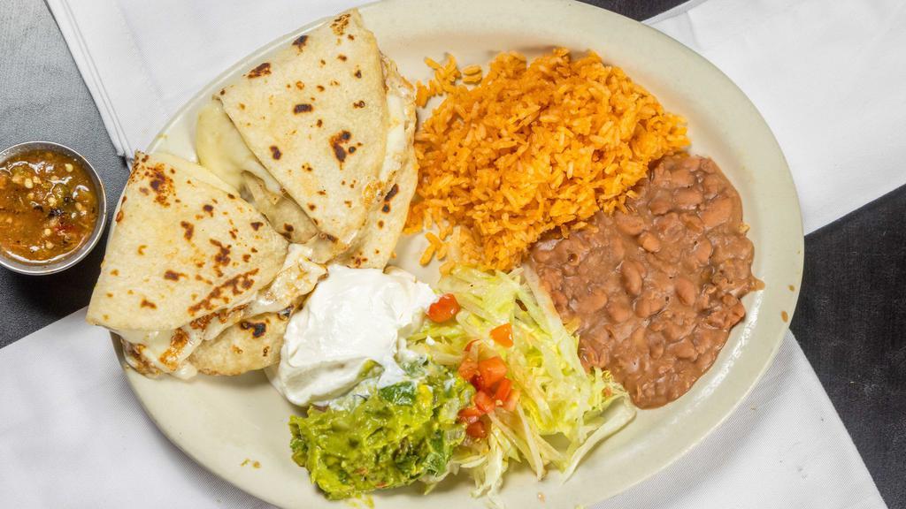 Quesadilla Plate · Three quesadillas served with guacamole, sour cream, rice and beans.